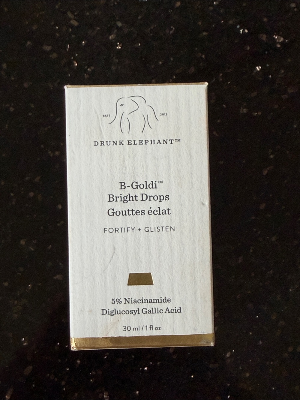 Drunk Elephant B-Goldi Bright Drops — White with Gold Accents